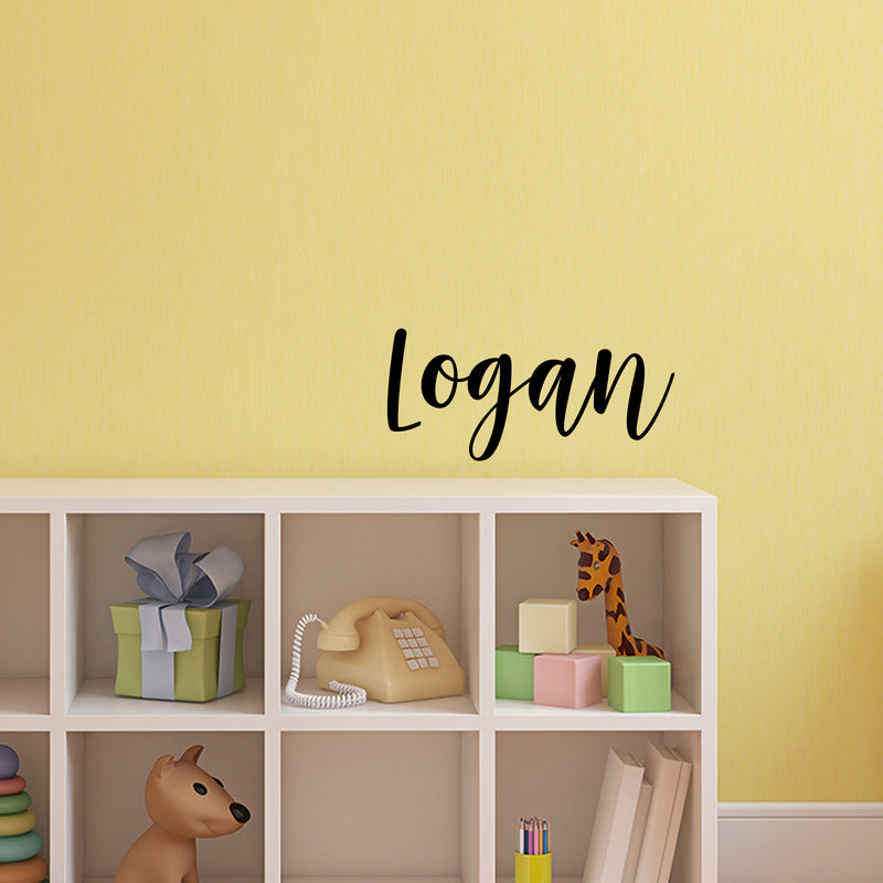 Vinyl Wall Art Decal Boys Custom Name - ’Logan’ Custom Text Name - 12" x 29" - Little Boys Bedroom Vinyl Wall Decals - Cute Wall Art Decals for Baby Boy Nursery Room Decor (12" x 29"; Black Cursive) 1