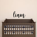 Vinyl Wall Art Decal Boys Custom Name - ’Liam’ Custom Text Name- 12" x 25" - Little Boys Bedroom Vinyl Wall Decals - Cute Wall Art Decals for Baby Boy Nursery Room Decor (12" x 25"; Black Cursive) 1