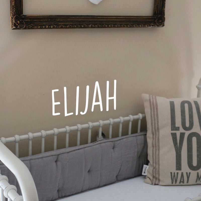 Vinyl Wall Art Decal Boys Custom Name - ’Elijah’ - 12" x 23" - Little Boys Bedroom Wall Decals - Cute Wall Art for Baby Boy Nursery Room Decor (12" x 23"; White Handwritten) 3