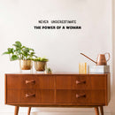 Vinyl Wall Art Decal - Never Underestimate The Power Of A Woman - 5" x 27.5" - Trendy Inspirational Feminism Quote Sticker For Women Home School Office Bedroom Feminist Woman Store Decor 2